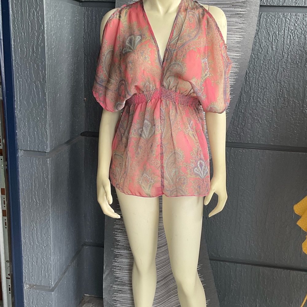 A very soft and sheer coral pink top with paisleys.